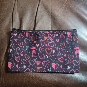 Handmade cosmetic bag featuring a "love hearts"